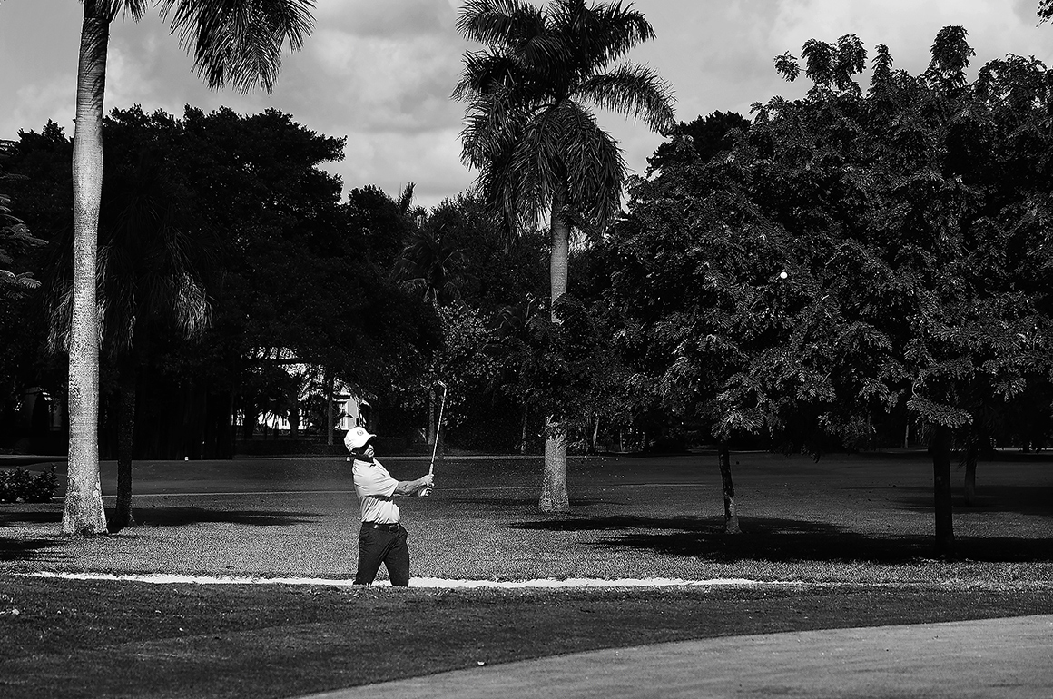 long green side bunker shot