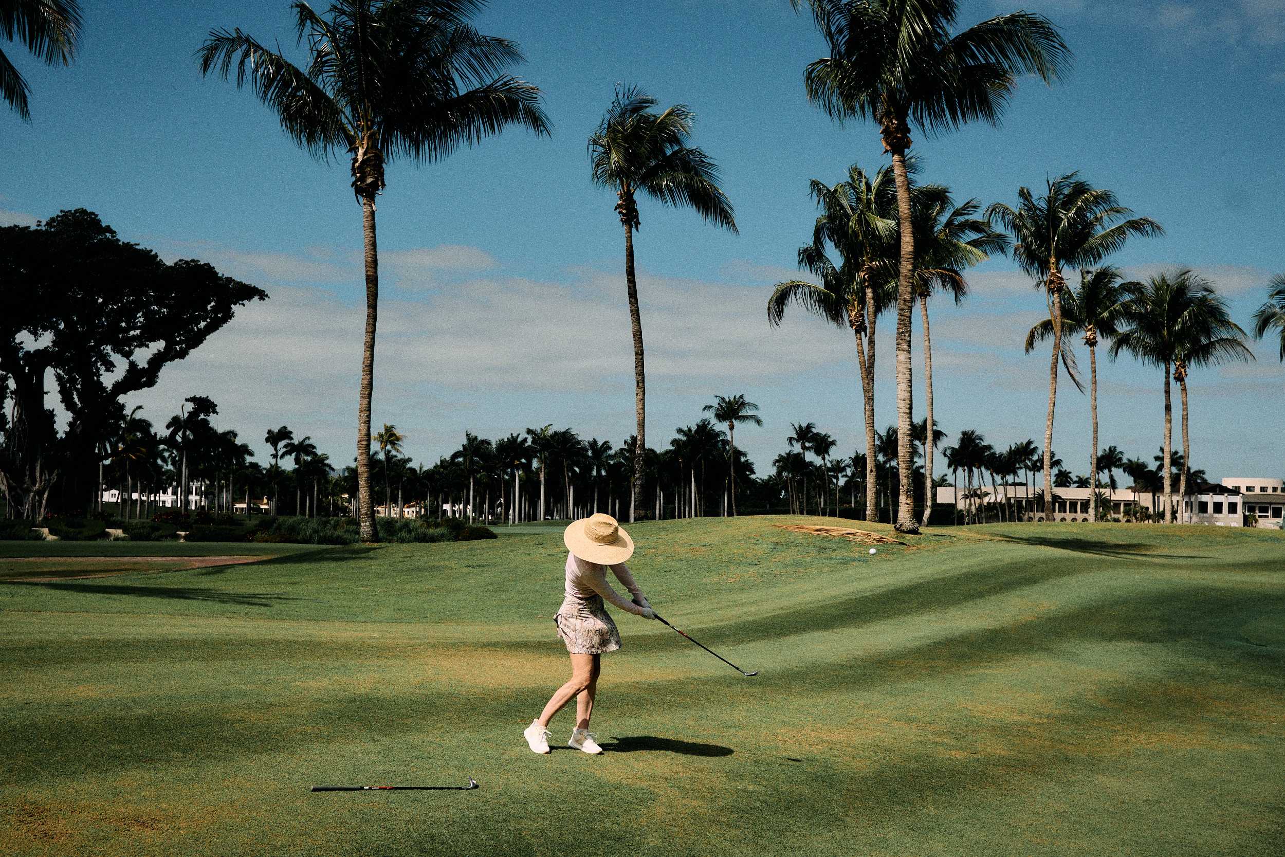 candid golf chipping chip shot moment captured with Nikon Zfc during a casual round